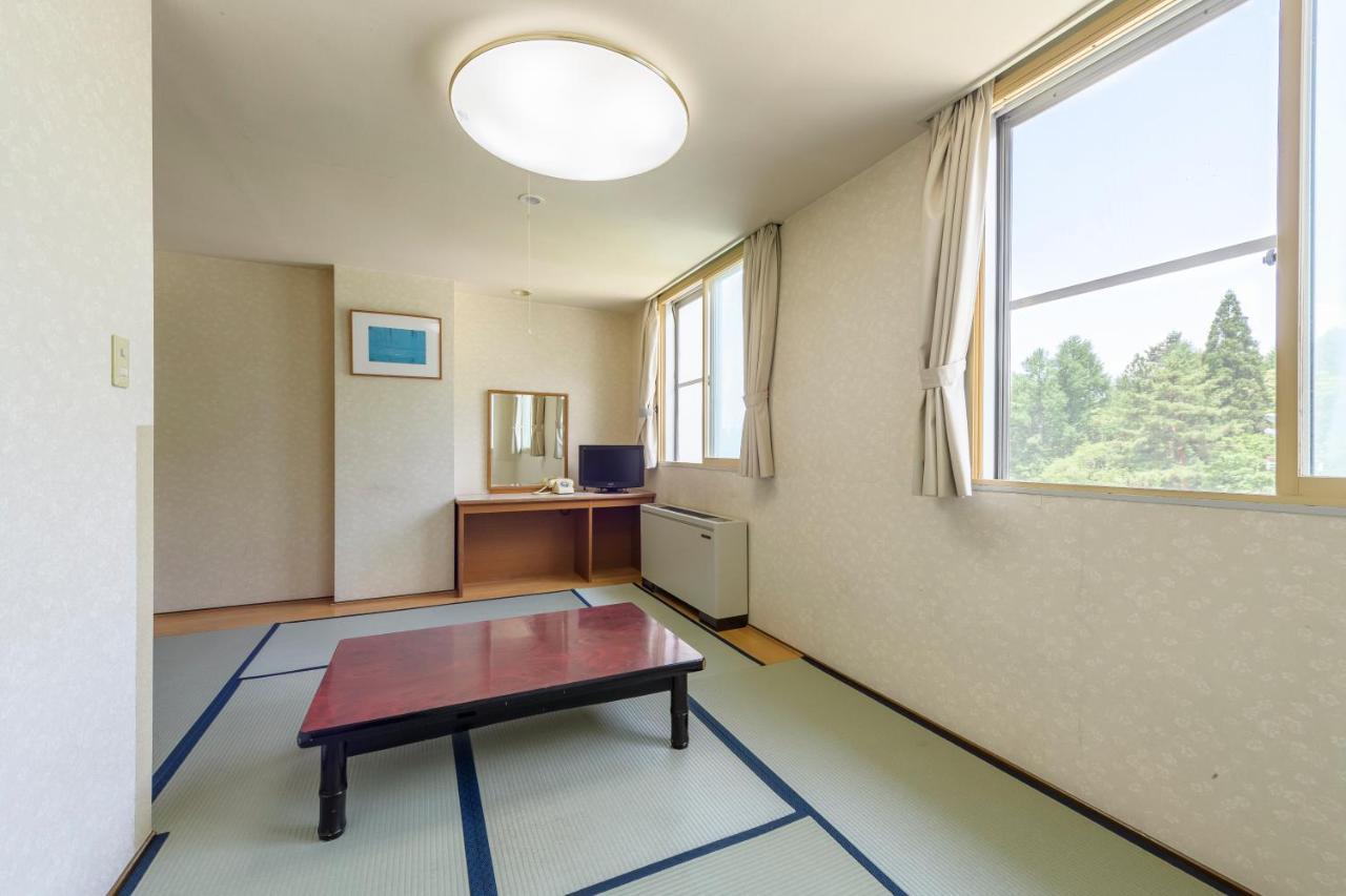 Hotel Tagawa Яманути Экстерьер фото